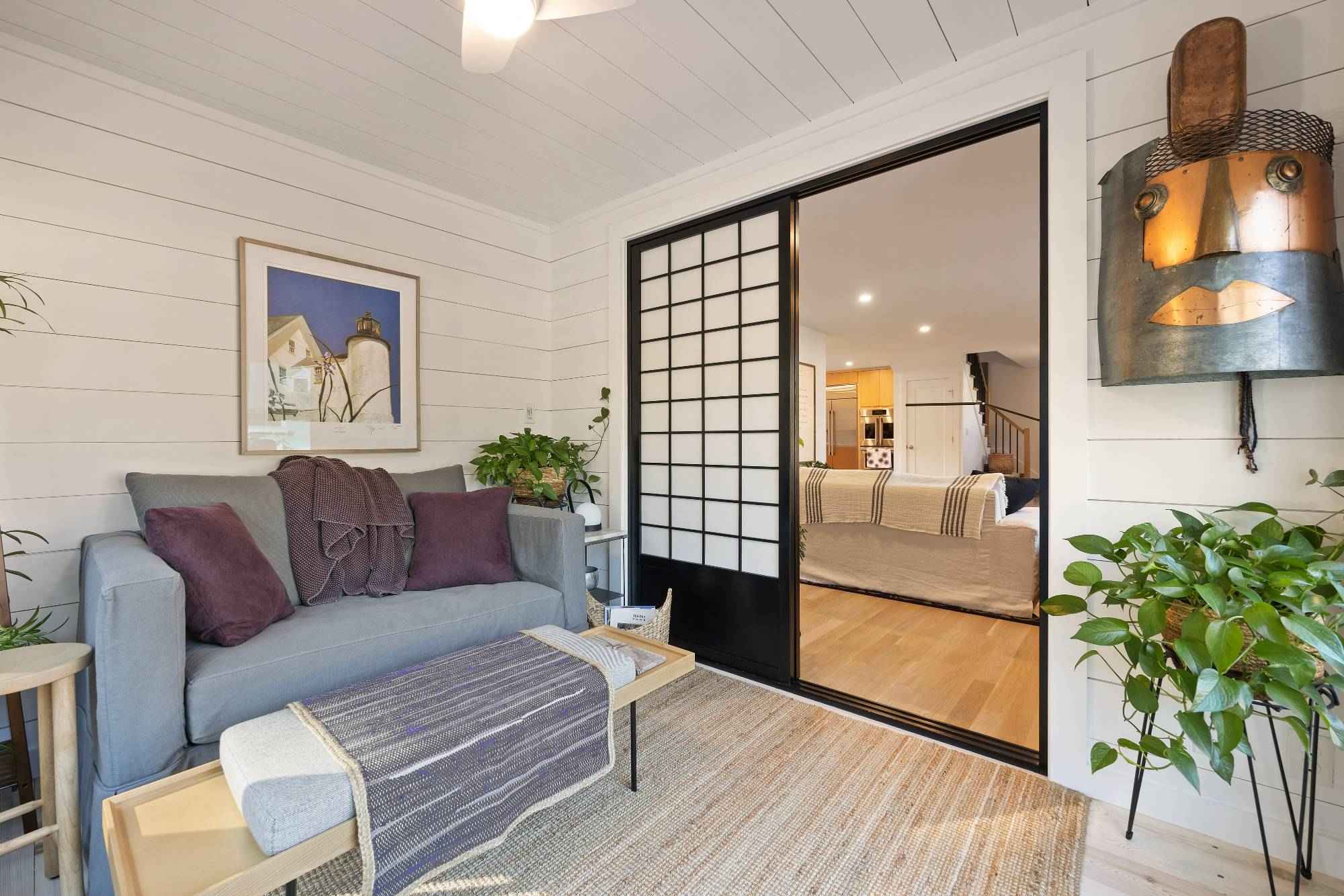 Sunroom with sliding doors connecting to living space by PEGASUS Design-to-Build in Melrose, MA kitchen and addition renovation-optimized-optimized