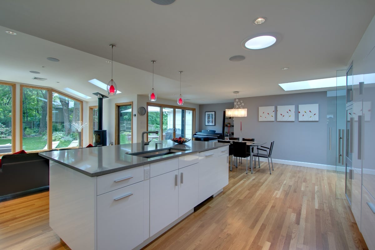 spacious kitchen remodel with island and dining area by PEGASUS Design-to-Build in Arlington, MA-optimized