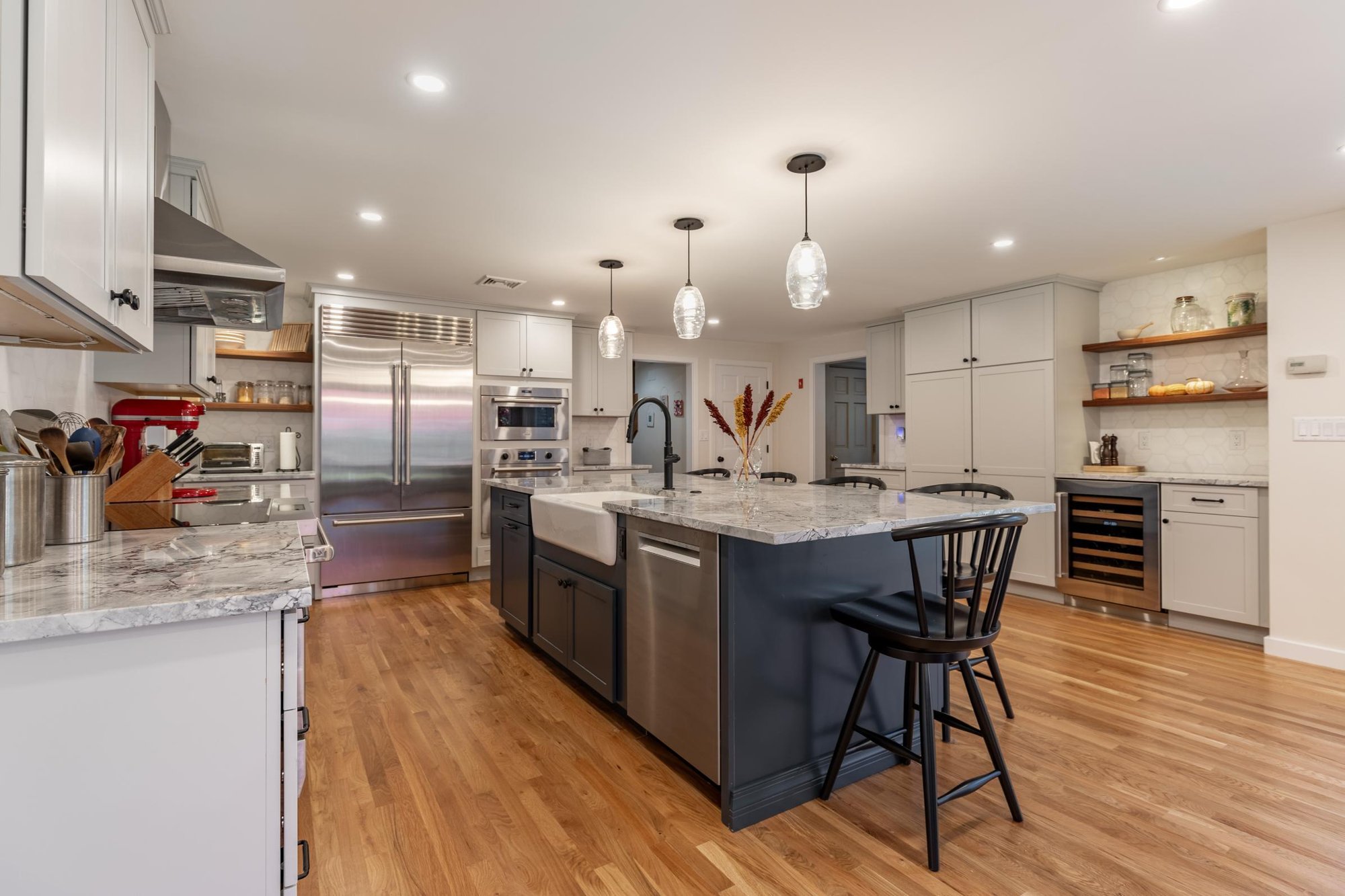 Angled view of Winchester open kitchen remodel by PEGASUS Design-To-Build