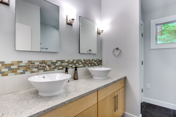 bathroom addition with double vessel sink vanity and modern fixtures by PEGASUS Design-to-Build in Lexington, MA