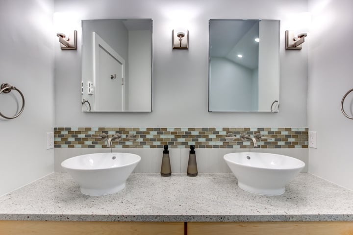 close-up of double vanity bathroom with vessel sinks and tile backsplash by PEGASUS Design-to-Build in Lexington, MA