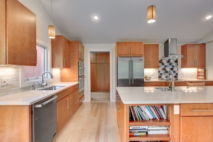 modern kitchen with island shelving and stainless refrigerator by PEGASUS Design-to-Build in Lexington, MA-optimized