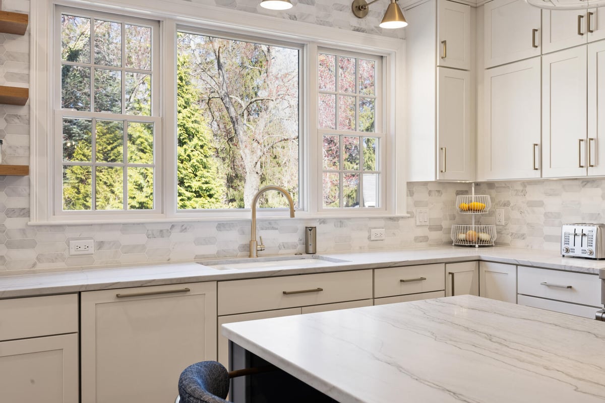 expansive kitchen addition with large island and open layout by PEGASUS Design-to-Build in Lexington, MA