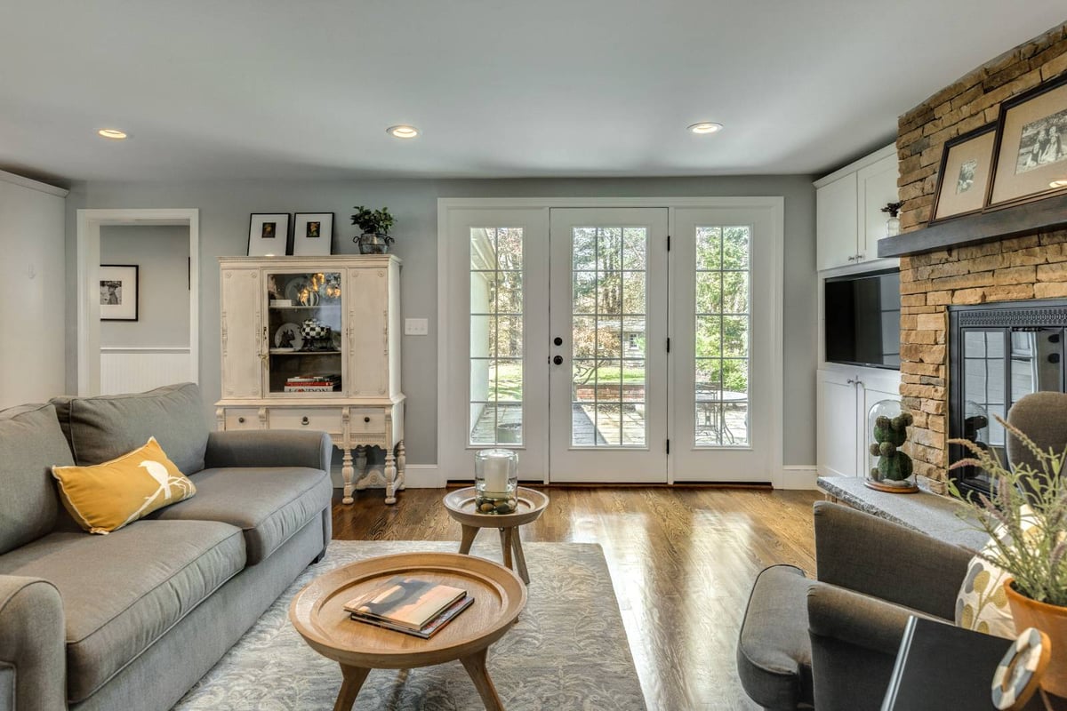 Living room remodel in Lexington, MA by PEGASUS Design-to-Build with French doors and natural light-optimized