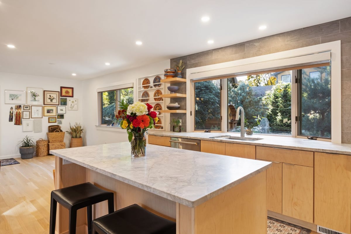 Kitchen island with decorative shelving and window backsplash by PEGASUS Design-to-Build in Melrose, MA kitchen and addition renovation-optimized