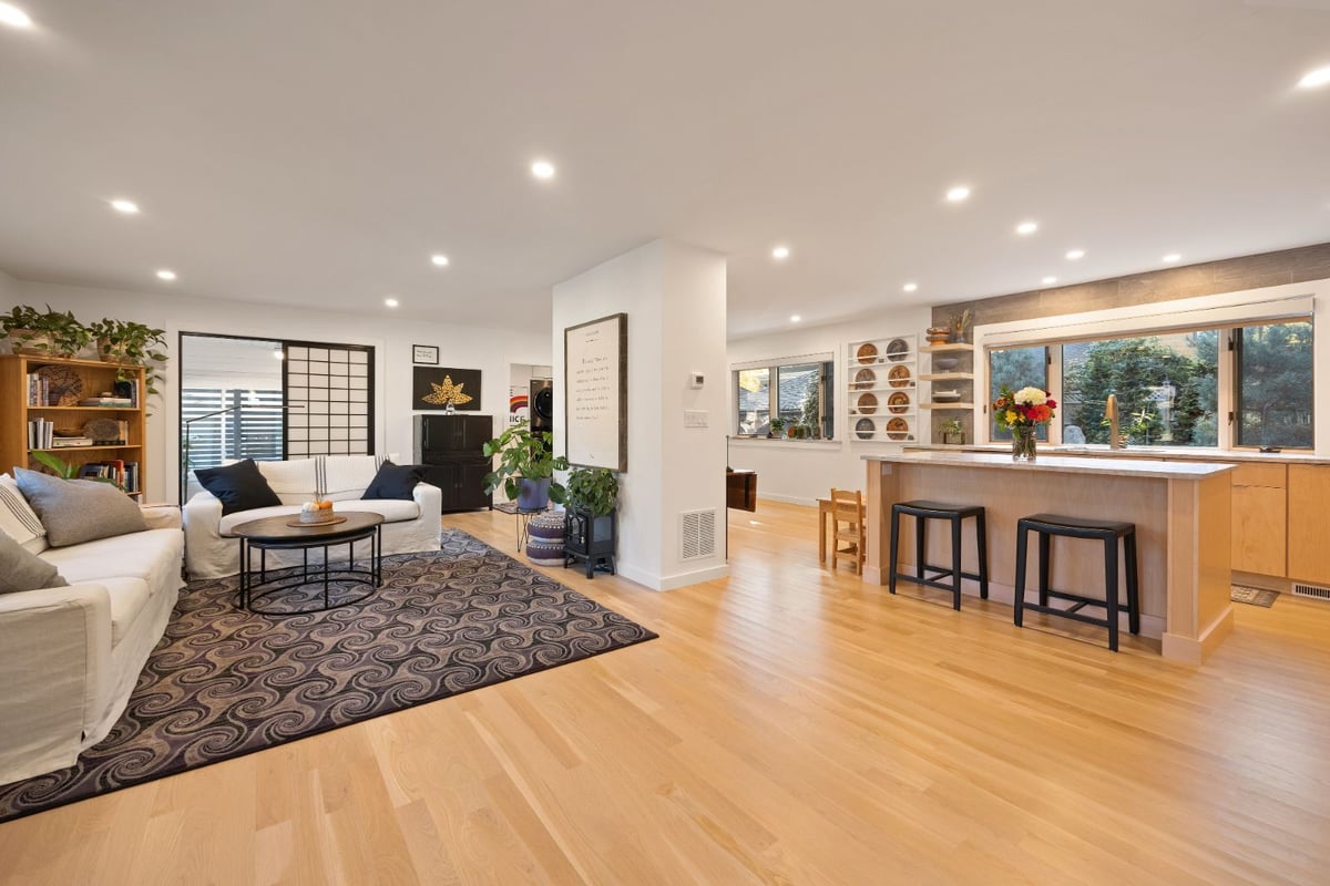 Open concept living room and kitchen remodel with hardwood floors by PEGASUS Design-to-Build in Melrose, MA kitchen and addition renovation-optimized