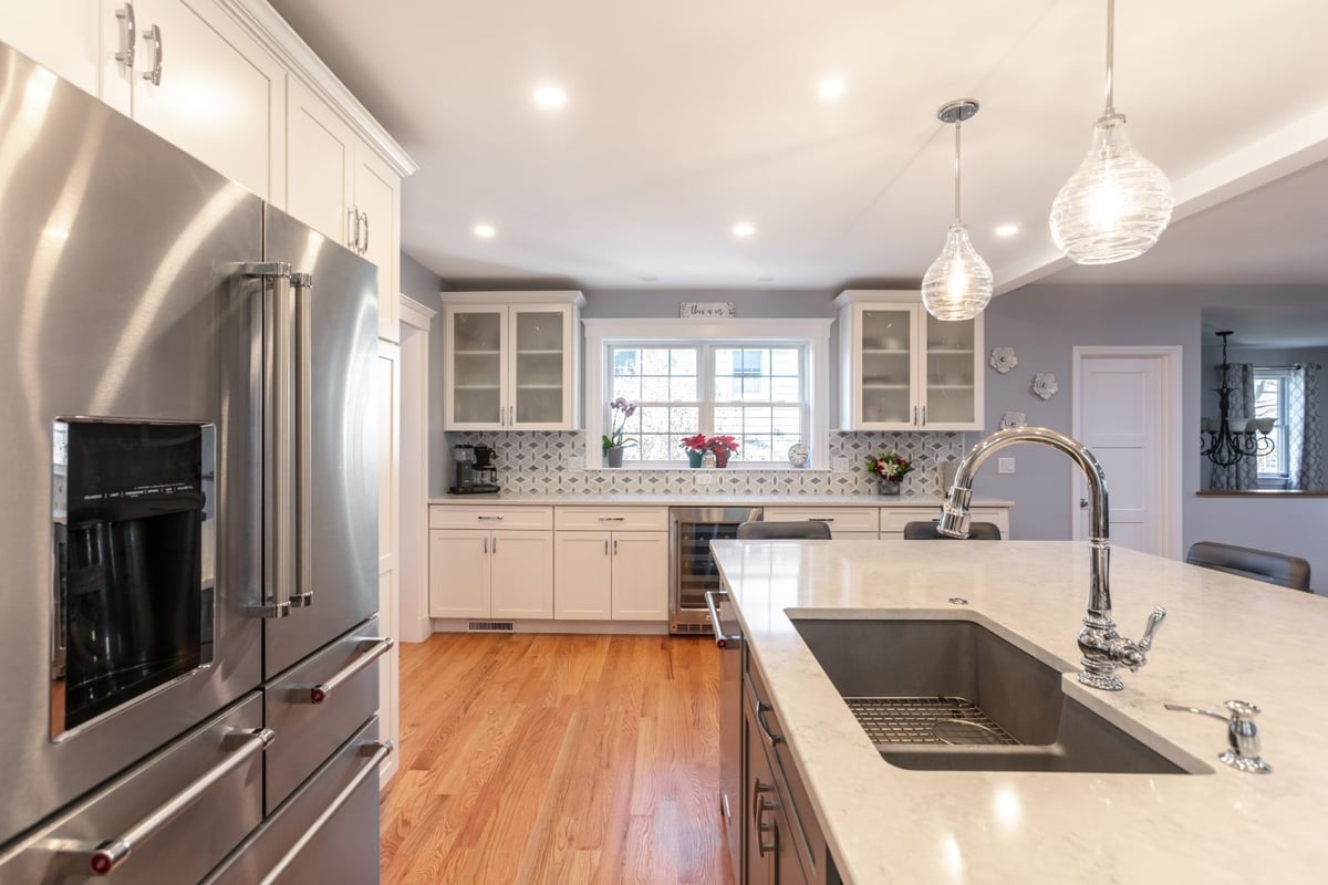 kitchen island sink with surrounding cabinetry in Melrose MA renovation by PEGASUS Design-to-Build-optimized