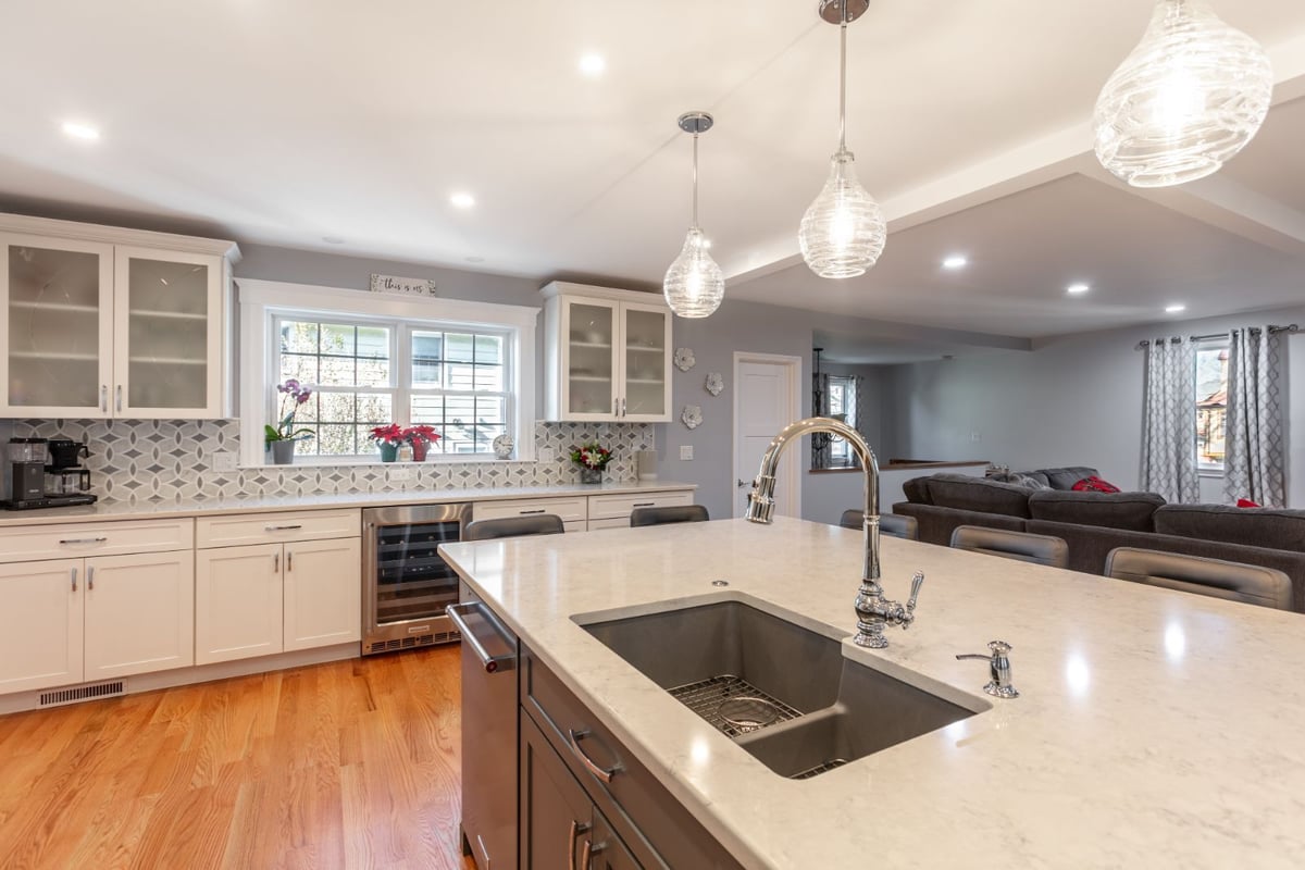 open kitchen flowing into living space in Melrose MA whole house renovation by PEGASUS Design-to-Build-optimized