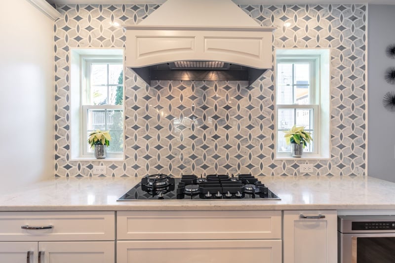 symmetrical kitchen cooktop wall with custom cabinetry in Melrose MA by PEGASUS Design-to-Build-optimized