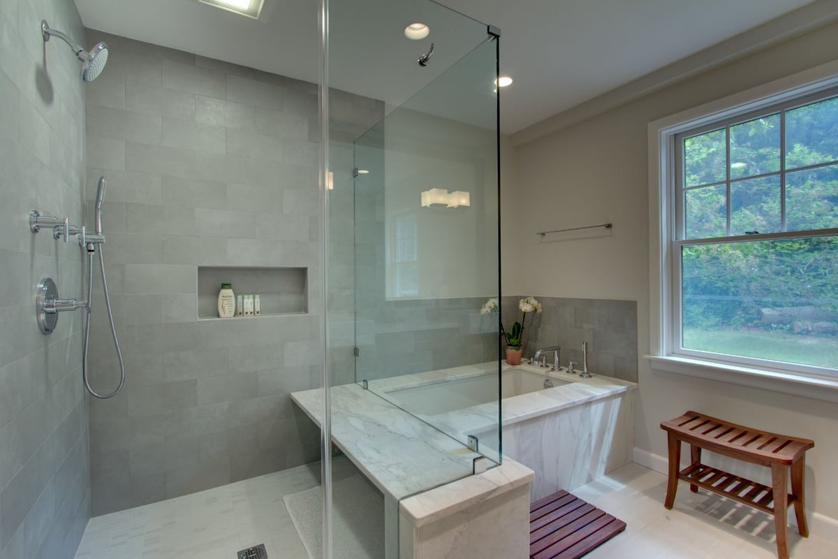 Luxury bathroom renovation in North Shore MA by PEGASUS Design-to-Build with glass shower and soaking tub-optimized