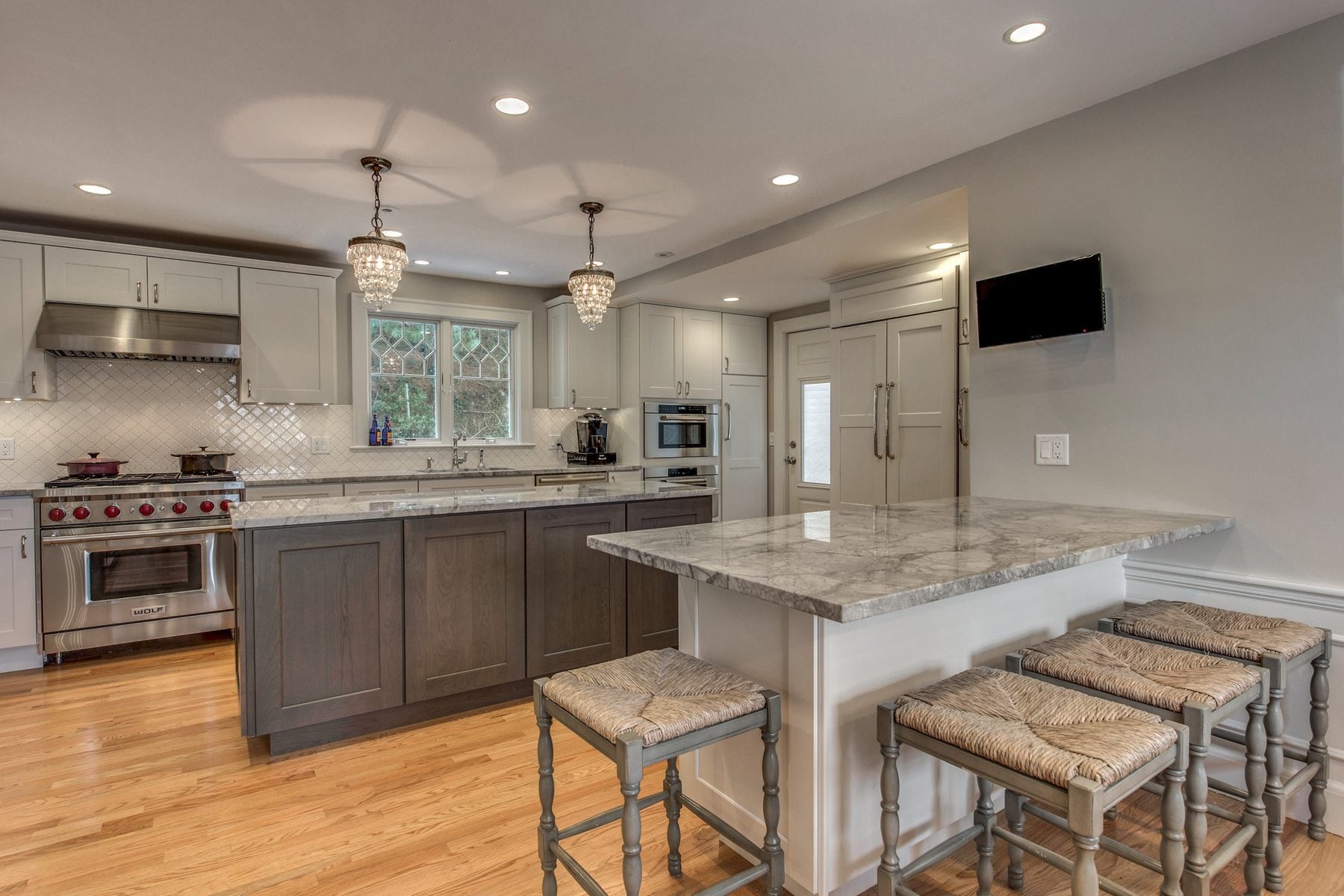 White and gray kitchen in a Belmont colonial