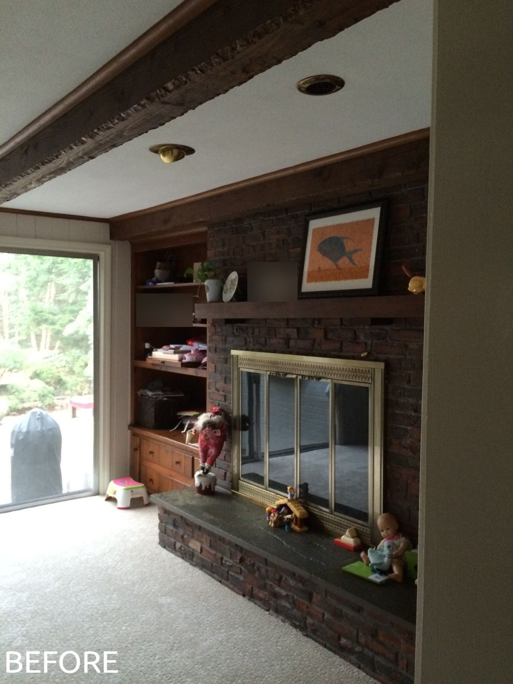 Before: Family room: carpet, wood shelving and a sliding door gave way to hardwood floors, built-in cabinets and French doors to the patio.