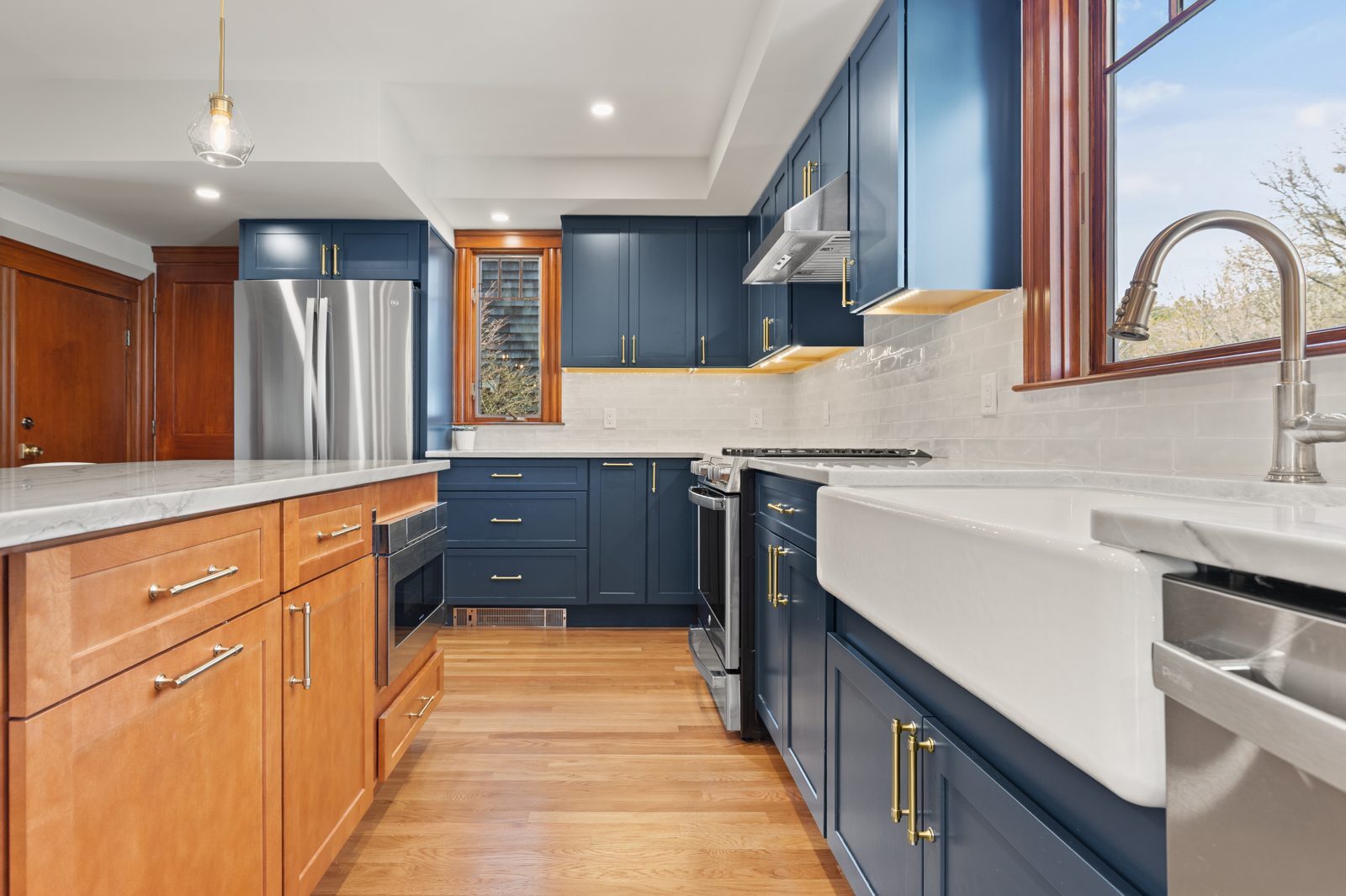 Farmhouse sink and quartzite counters in the Melrose kitchen