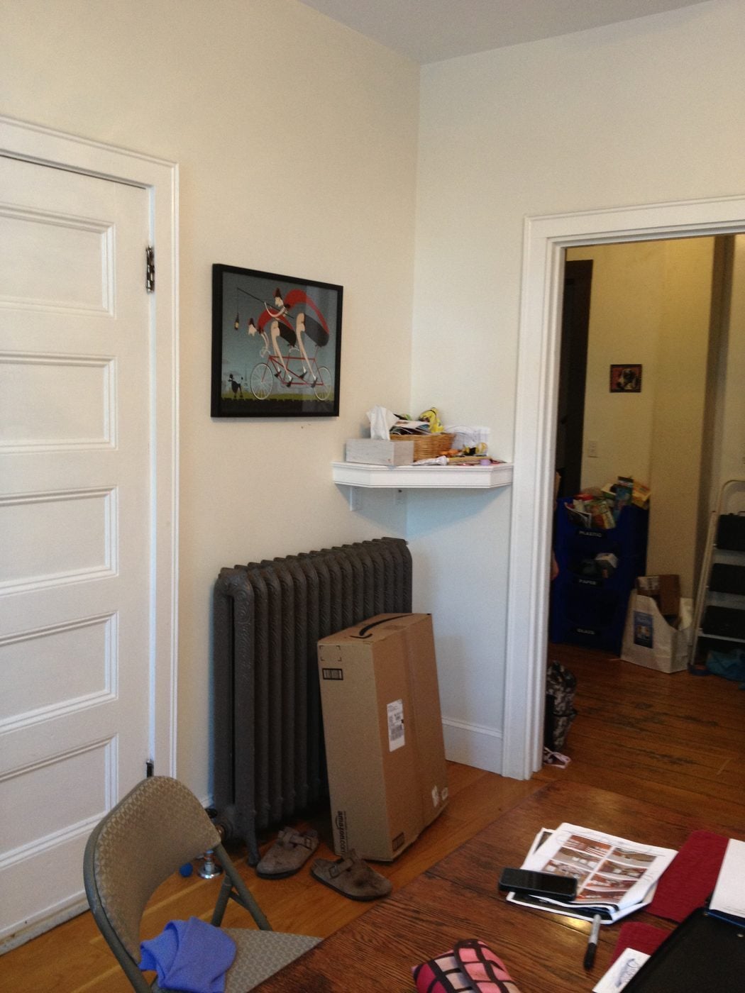 Before: Eating area: a cramped corner with a radiator became an open dining spot under a coffered ceiling, with doors out to the family room and yard.